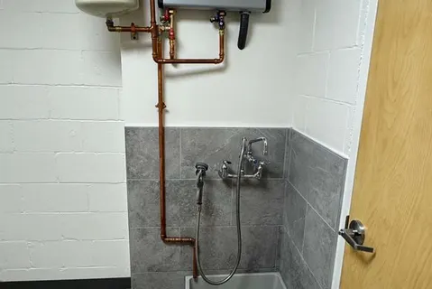 Utility sink and copper water lines plumbed by Desert Peak Plumbing Solutions