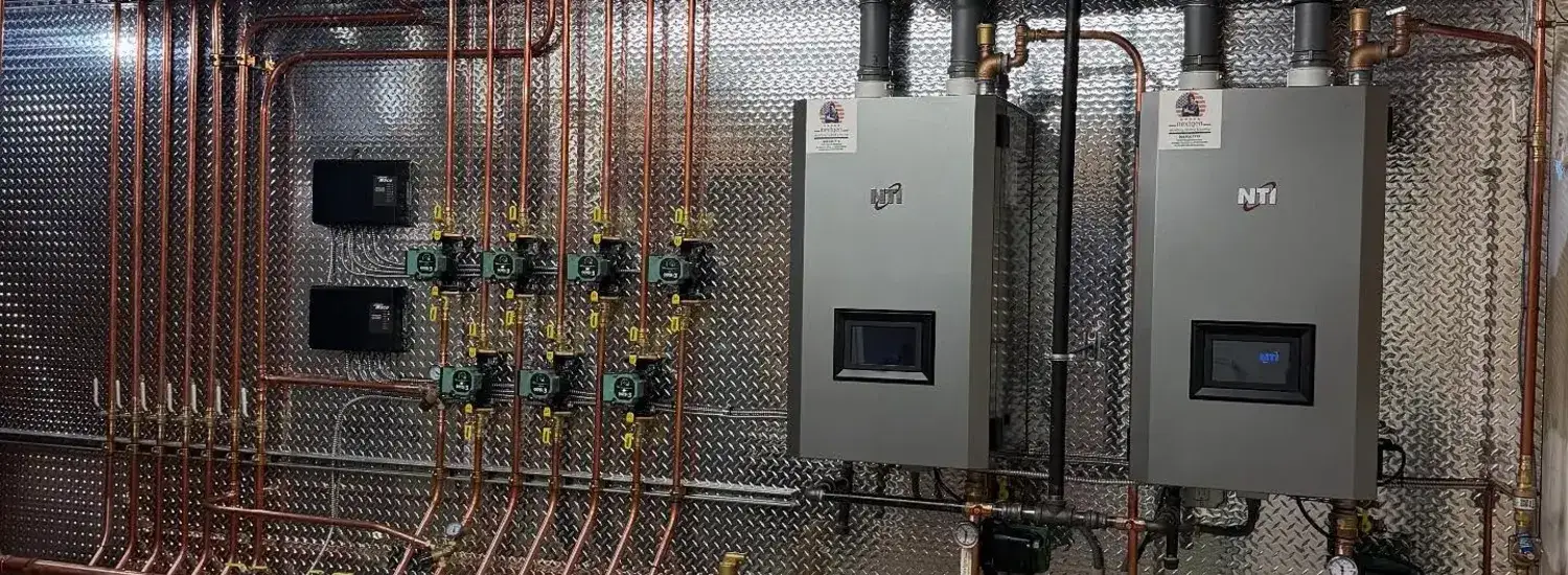 Multi-boiler mechanical room retrofit by Desert Peak Plumbing Solutions in Henderson, NV